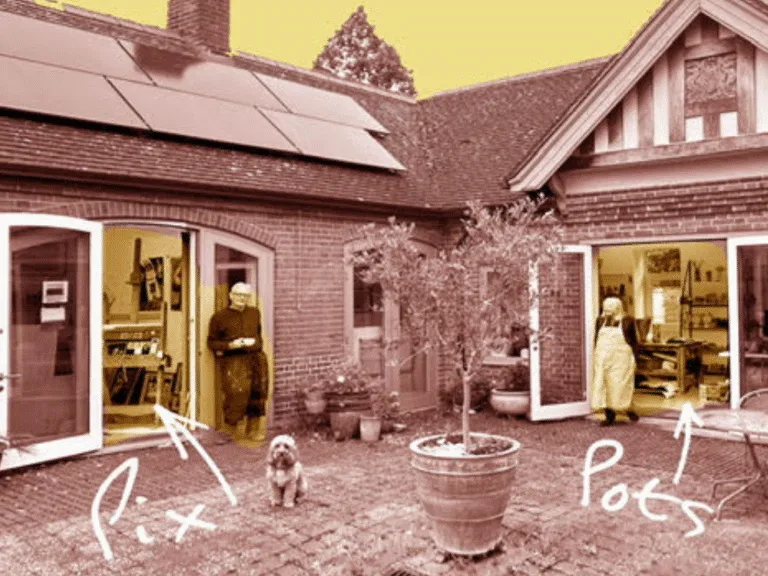 Duotone image of Simon Farr and Anne Lee standing outside their respective studios situated around a courtyard with a potted tree in the middle