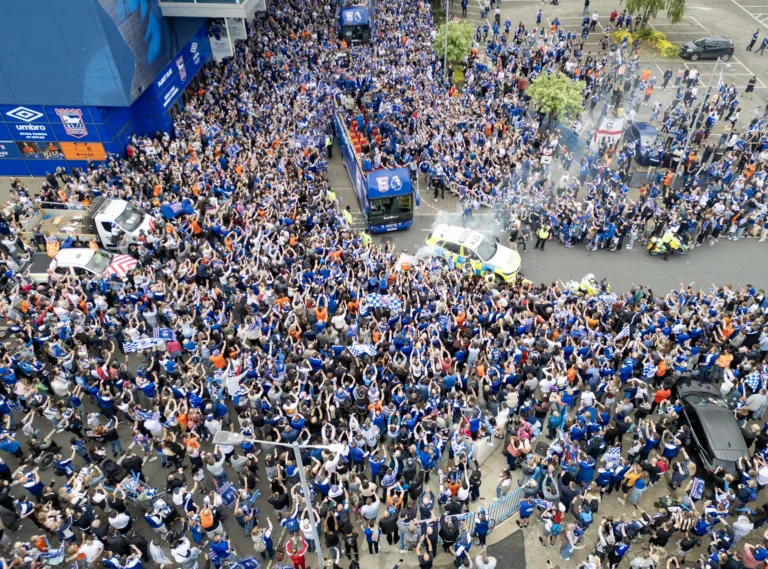 Ipswich unites for Premier League promotion parade as the whole town turns blue