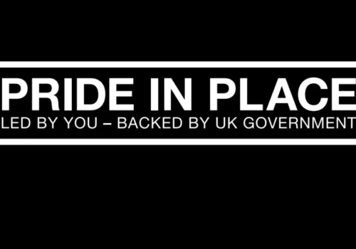 black background with Pride in Place - Led by You, Backed by UK Government text in white, inside a white border
