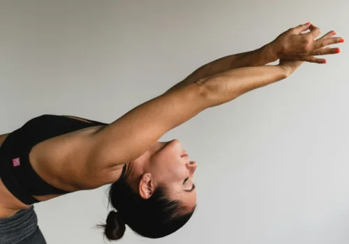 woman stretching arms
