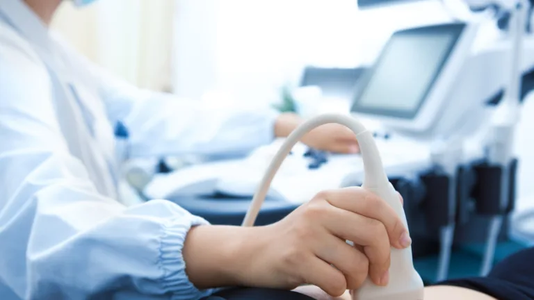 A medical setting with someone having an ultrasound scan