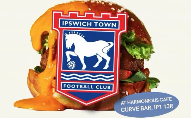 Loaded burger with an ITFC badge in front